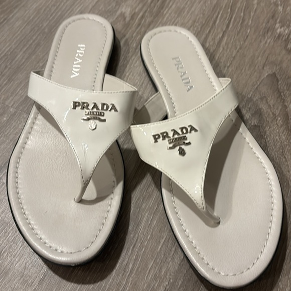 NIB Auth Prada white patent thong sandals. Prada logo in silver. - Picture 1 of 11